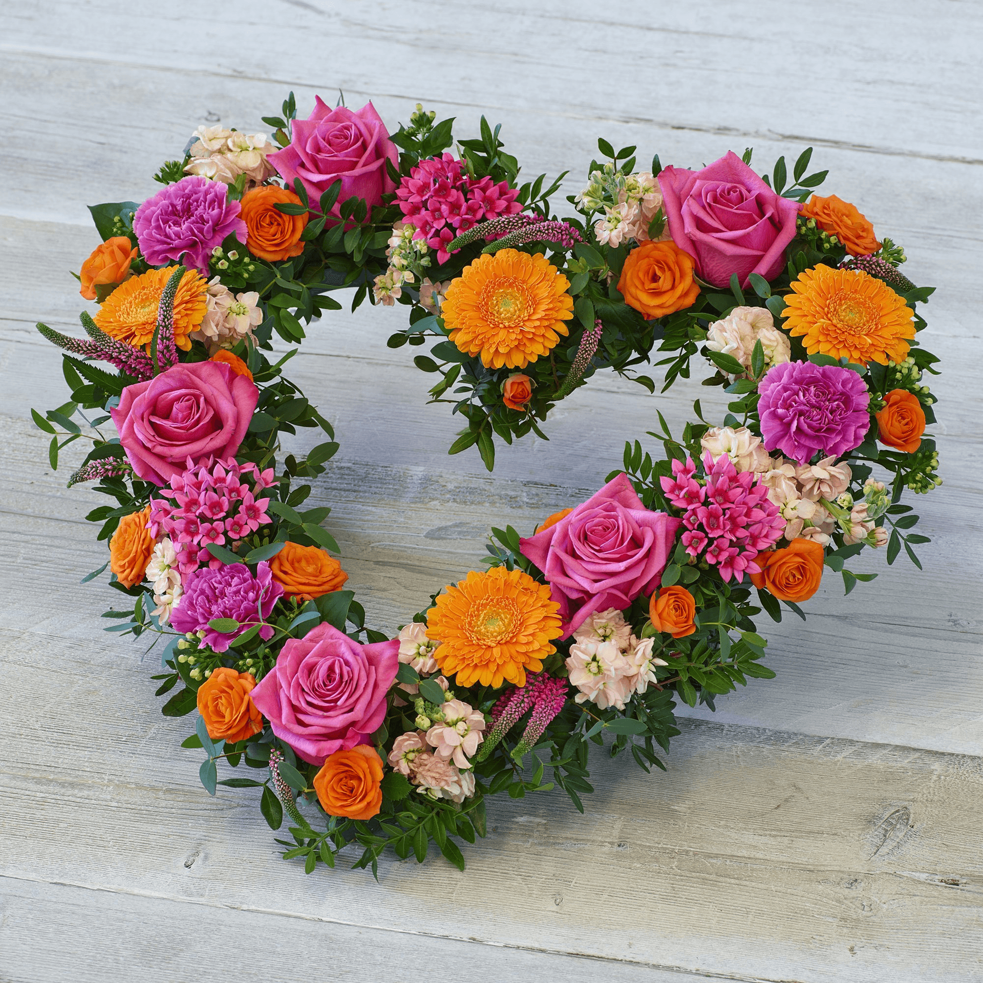 Bold Brights Heart — Funeral hand-tied bouquet