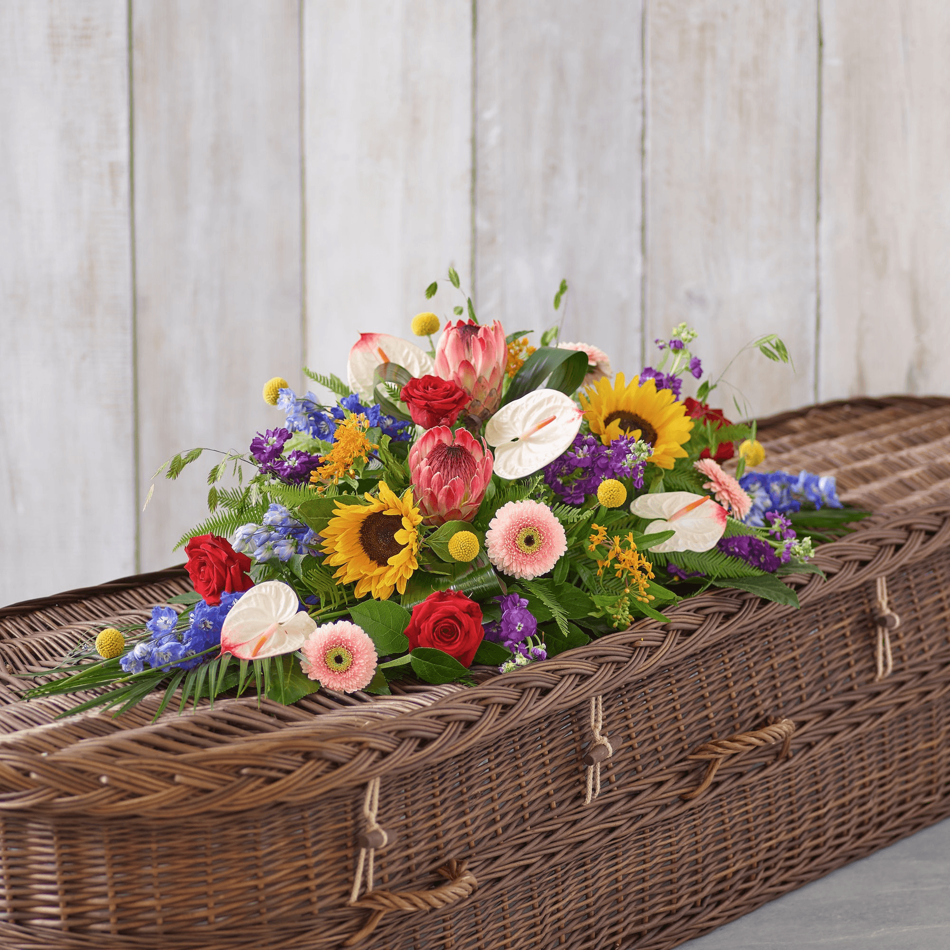 Natural Vibrance Casket Spray — Funeral hand-tied bouquet